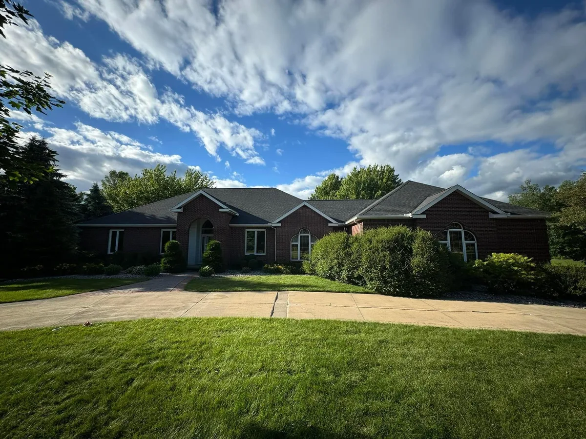 A home with a new roof installed by a contractor in the Vetted Home Pros network
